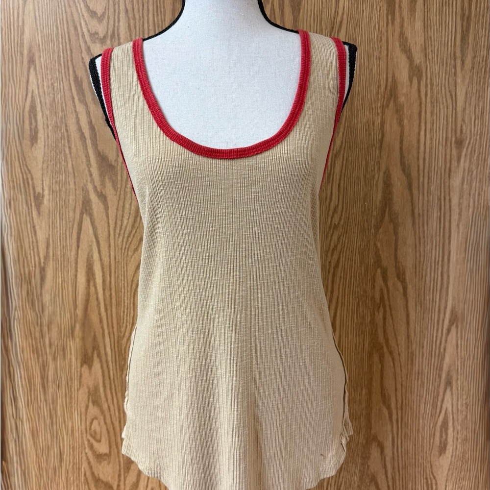 Free People ribbed beige tank top with red trim. Back seaming.